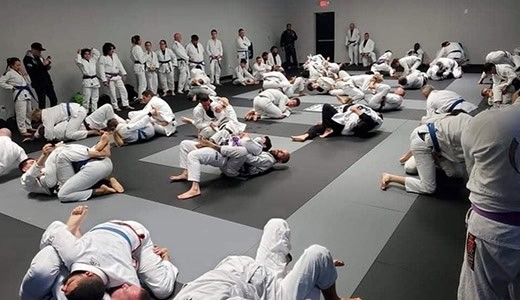 Jiu-Jitsu students practicing techniques in a training session at Legacy Jiu-Jitsu Academy.
