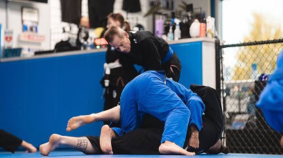Young athletes practicing Brazilian Jiu-Jitsu techniques at Legacy Jiu-Jitsu Academy.