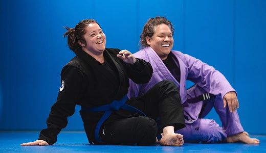 Women practicing self-defense techniques in Jiu-Jitsu class at Legacy Jiu-Jitsu Academy.