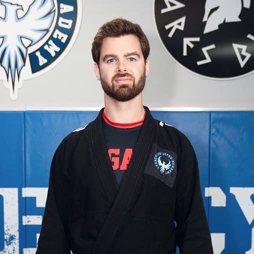 Man in black Jiu-Jitsu gi at Legacy Jiu-Jitsu Academy, About Us.